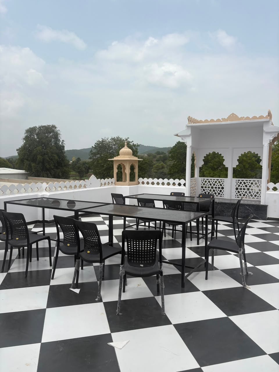 Rooftop restaurant at Royal Madhav Niwas with city views